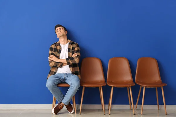Waiting Young Man Sitting Chair Color Wall — Stock Photo, Image