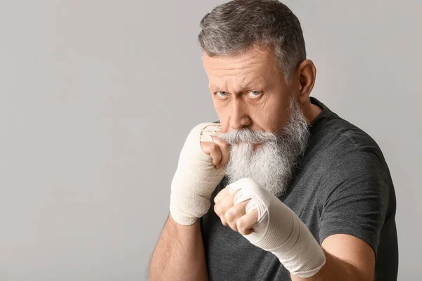 Sporty Elderly Man Applied Wrist Bands Grey Background — Stock Photo, Image