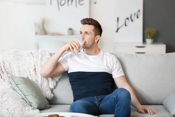 Young Man Drinking Milk Home — Stock Photo, Image