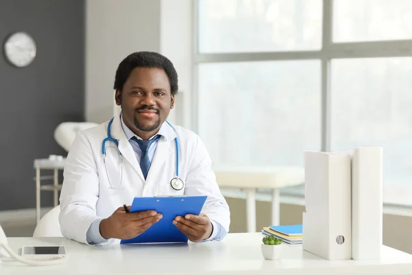 Male African-American doctor in clinic