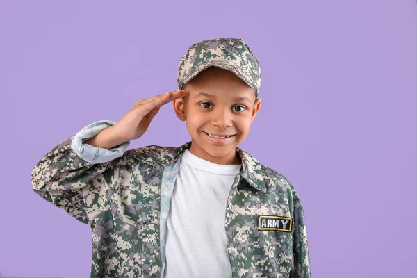 Little Saluting African American Soldier Color Background — Stock Photo, Image