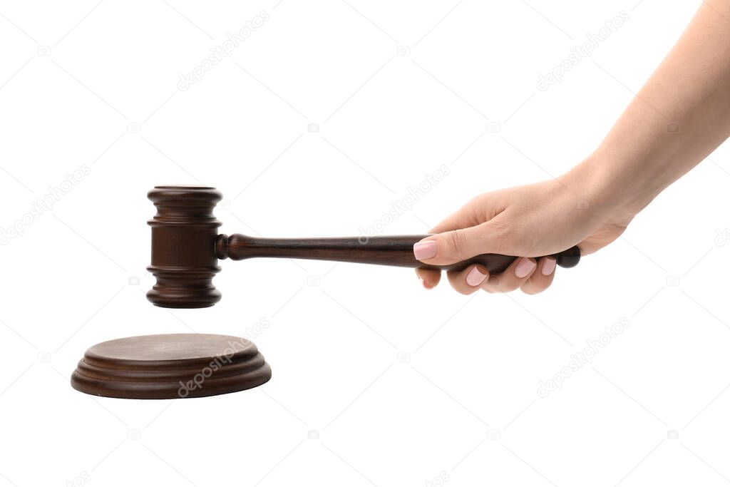 Female hand with judge's gavel on white background