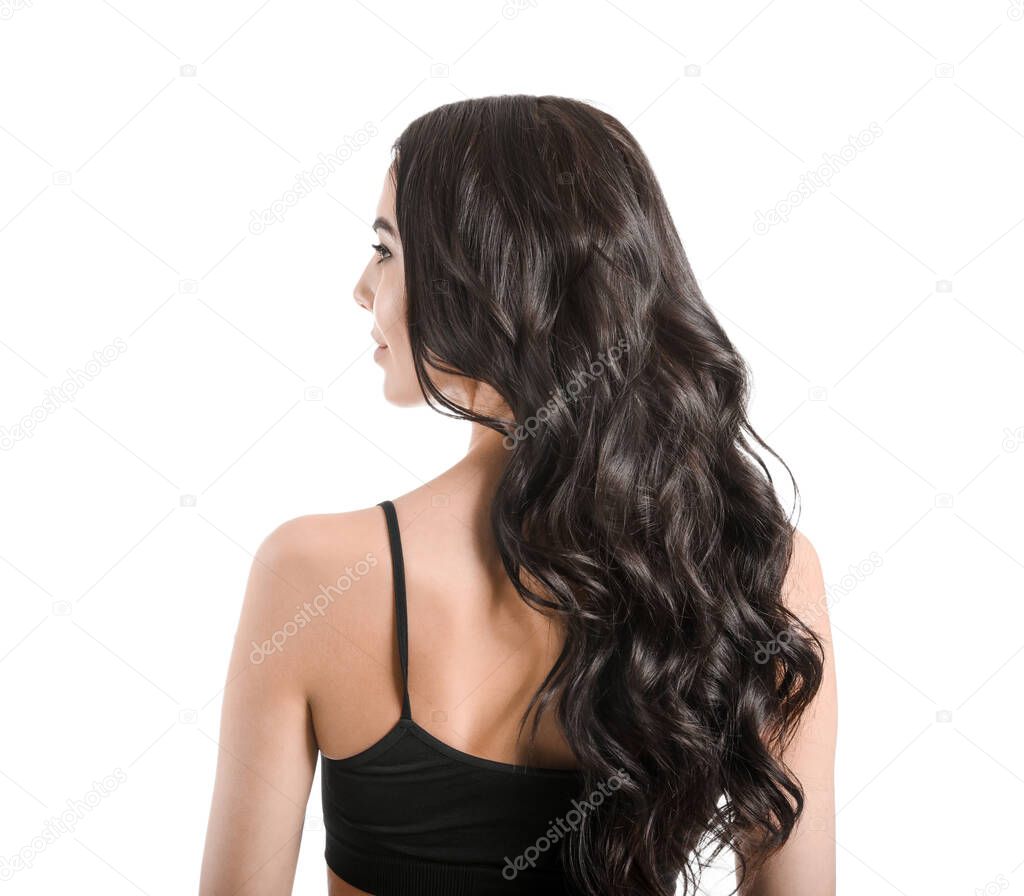 Young woman with beautiful healthy hair on white background