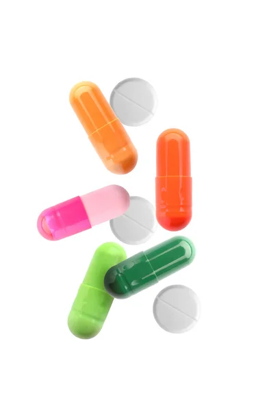 Verschillende Vallende Pillen Witte Achtergrond — Stockfoto