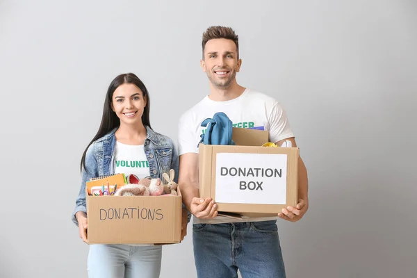 Volunteers Donations Orphans Grey Background — Stock Photo, Image