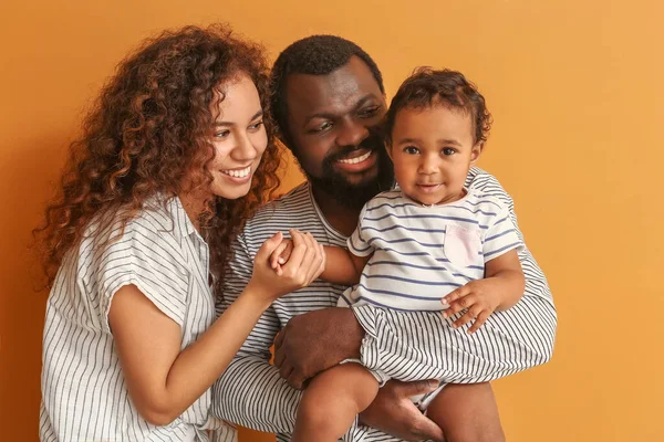 Happy African American Parents Cute Baby Color Background — Stock Photo, Image