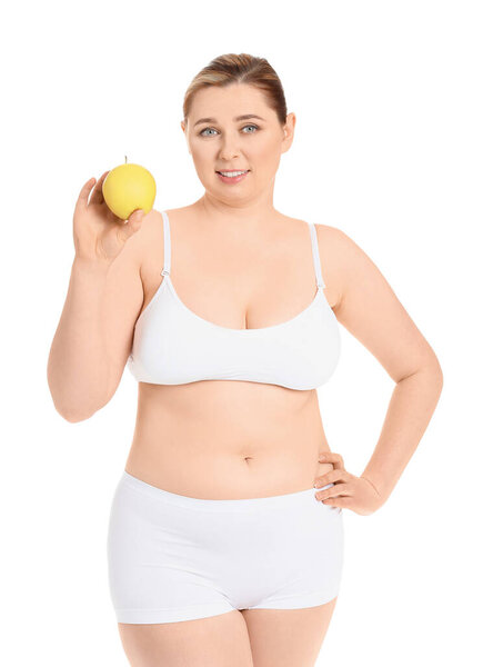 Overweight woman with apple on white background. Weight loss concept