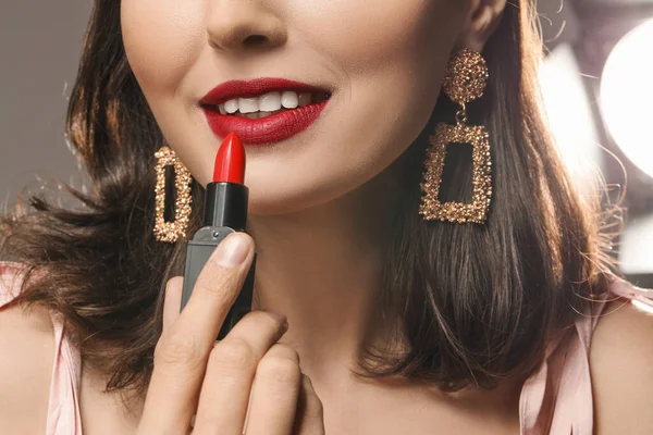 Beautiful Young Woman Applying Makeup Grey Background Closeup — Stock Photo, Image