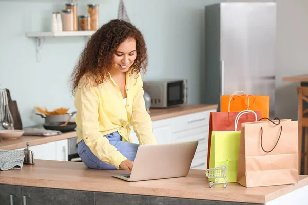 Young Woman Laptop Shopping Bags Home — Stock Photo, Image