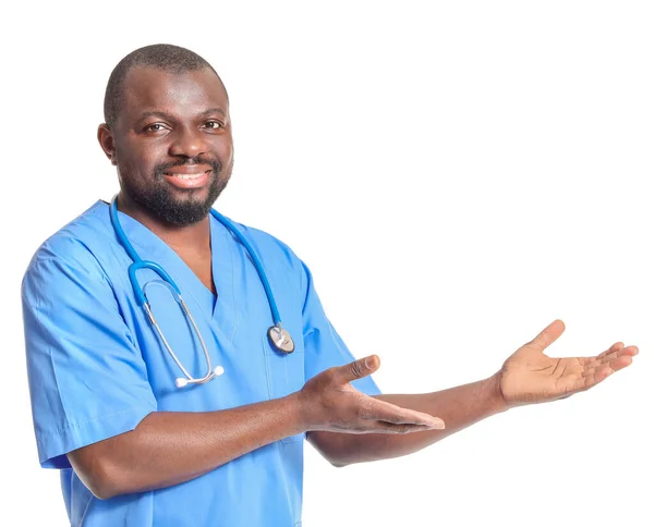 African American Doctor Showing Something White Background — Stock Photo, Image