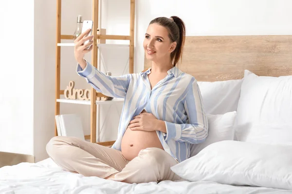 Beautiful Pregnant Woman Taking Selfie Bedroom — Stock Photo, Image