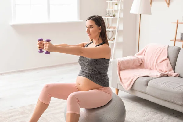 Beautiful Sporty Pregnant Woman Training Dumbbells Home — Stock Photo, Image