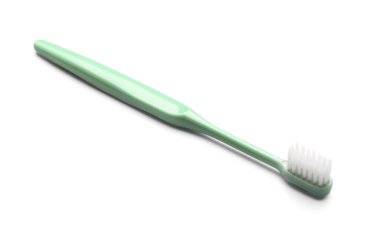 Beyaz arkaplanda diş fırçası