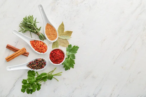 Different spices on white background