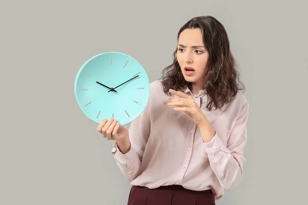 Worried Businesswoman Clock Grey Background Time Management Concept — Stock Photo, Image