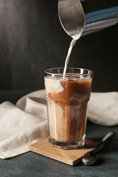 Pouring Milk Cold Coffee Glass Dark Background — Stock Photo, Image