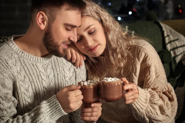 Happy Young Couple Drinking Hot Cocoa Home — Stock Photo, Image