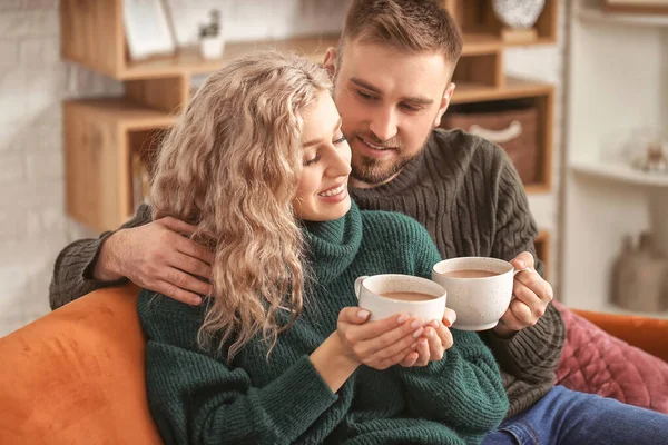 Happy Young Couple Drinking Hot Cocoa Home — Stock Photo, Image