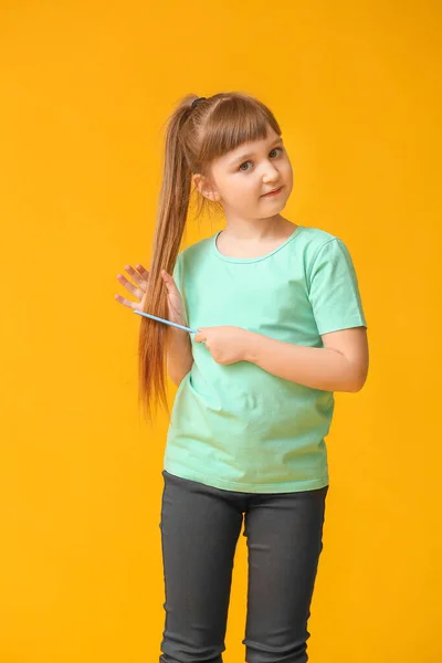 Little Girl Combing Hair Color Background — Stock Photo, Image