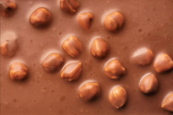 Süße Schokolade Mit Nüssen Als Hintergrund — Stockfoto