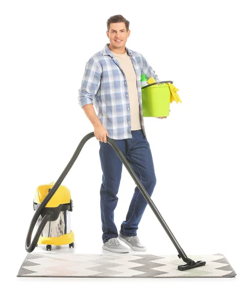 Young Man Hoovering Carpet White Background — Stock Photo, Image