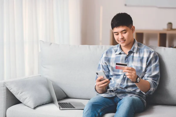 Asian Man Shopping Online Home — Stock Photo, Image