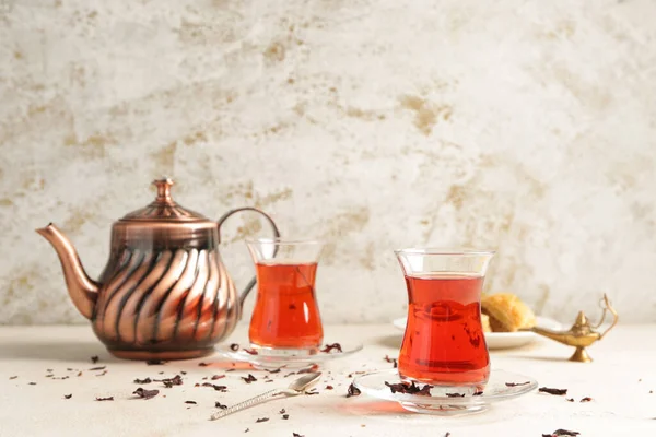 Tasty Turkish tea on light background