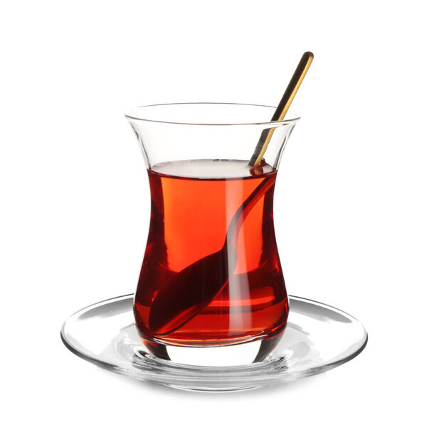 Glass of tasty Turkish tea on white background