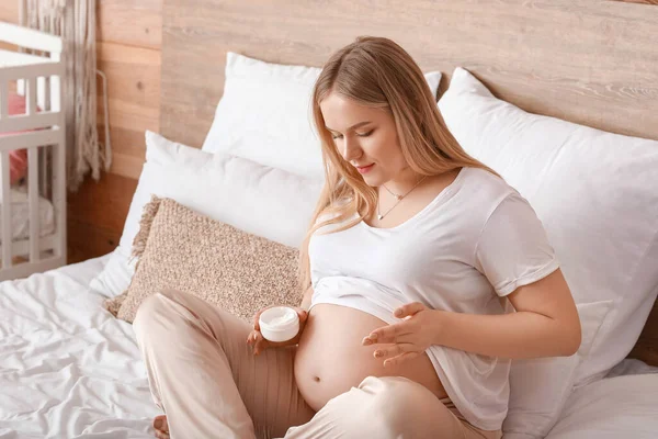 Beautiful Pregnant Woman Applying Cream Bedroom — Stock Photo, Image