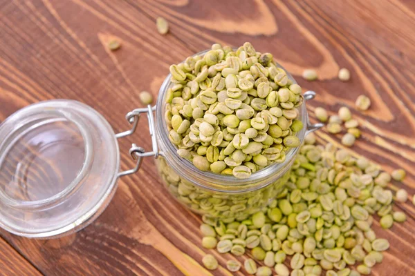 Jar Green Coffee Beans Table — Stock Photo, Image