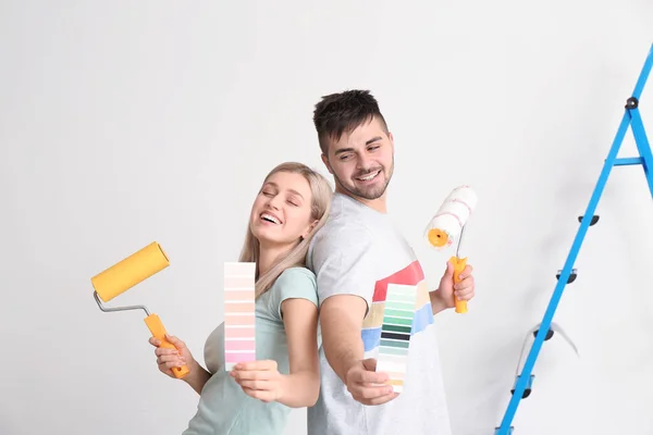 Young Couple Color Swatches Paint Roller White Background — Stock Photo, Image
