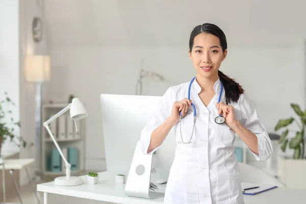 Female Asian doctor in clinic