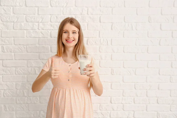 Beautiful Pregnant Woman Milk Showing Thumb White Brick Background — Stock Photo, Image