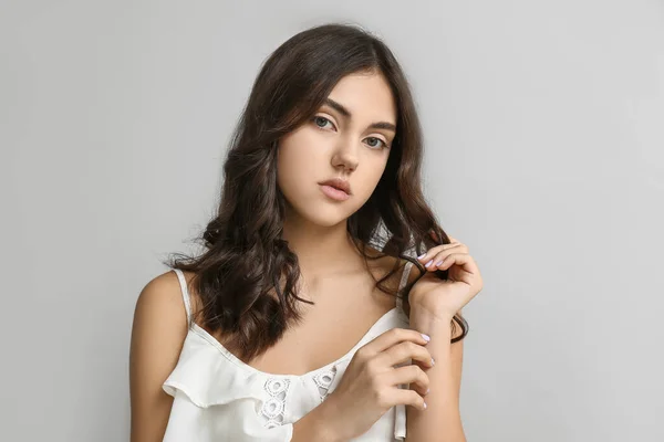 Young Woman Beautiful Curly Hair Grey Background — Stock Photo, Image