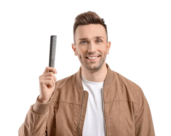 Joven Guapo Con Peine Sobre Fondo Blanco —  Fotos de Stock