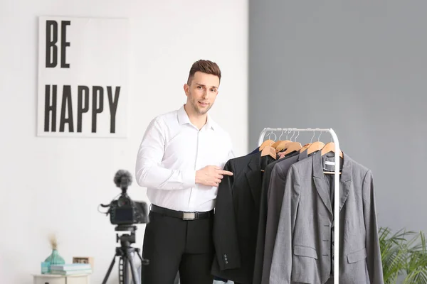 Young Male Stylist Rack Clothes Studio — Stock Photo, Image