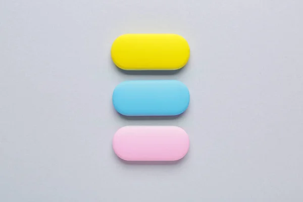 Bright Erasers Grey Background — Stock Photo, Image