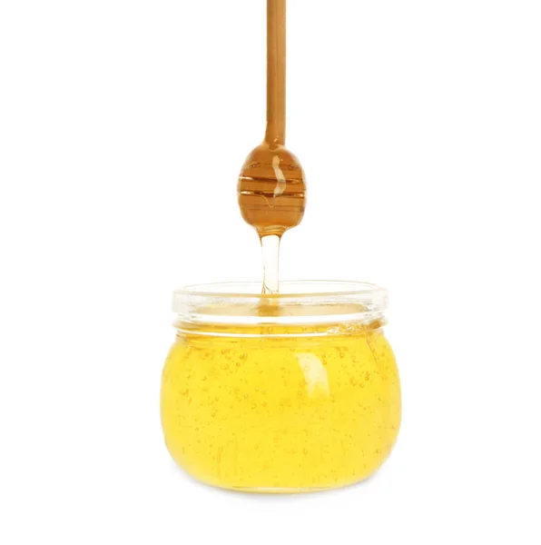 蜂蜜滴下から滴下で瓶に白の背景 — ストック写真
