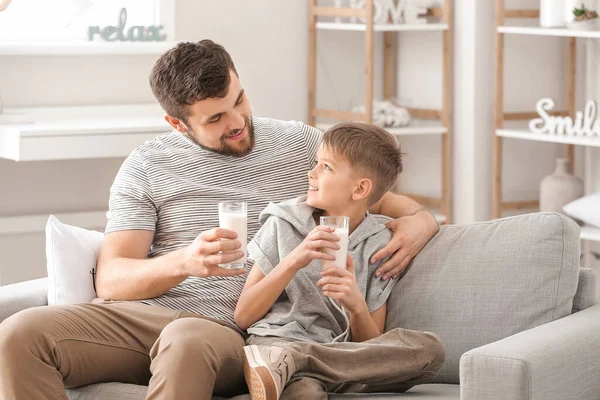 Father His Little Son Drinking Milk Home — Stock Photo, Image