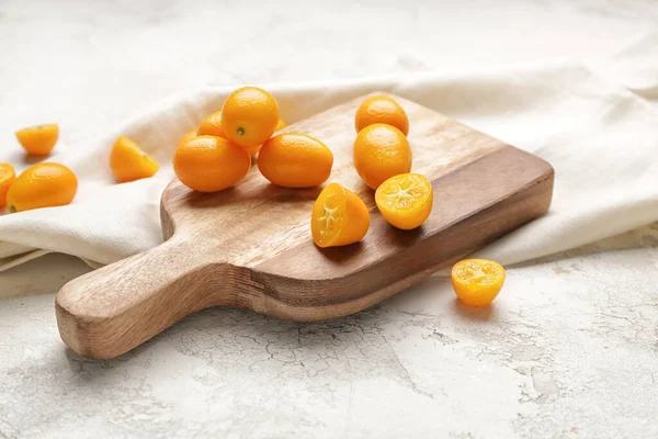 Board Tasty Kumquat Fruit White Background — Stock Photo, Image