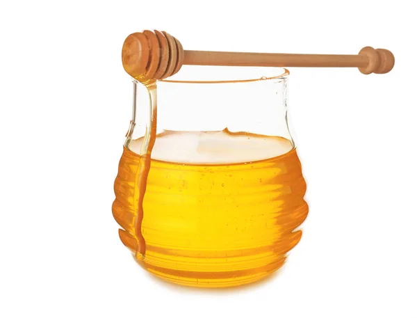 白い背景に甘い蜂蜜の瓶 — ストック写真
