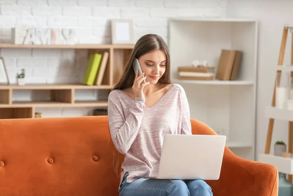 Beautiful Young Woman Laptop Talking Mobile Phone Home — Stock Photo, Image