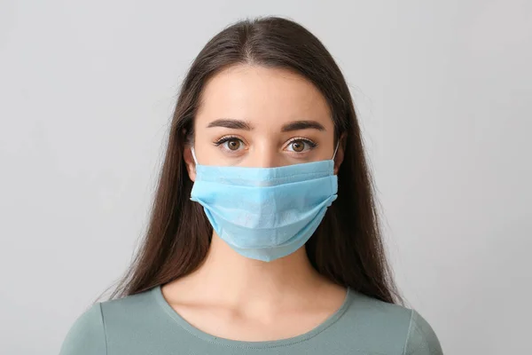 Young Woman Wearing Medical Mask Grey Background — Stock Photo, Image