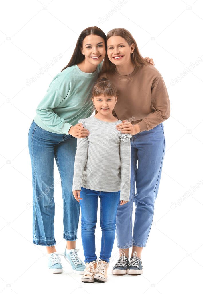 Happy lesbian couple with little adopted girl on white background