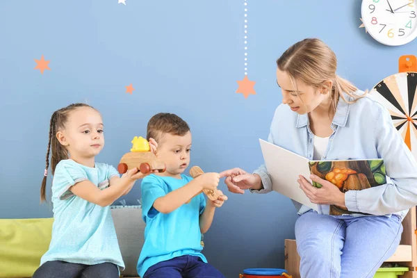 Nanny Cute Little Children Reading Book Home — Stock Photo, Image