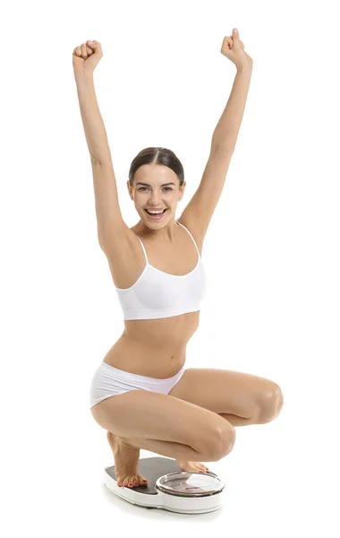 Glückliche Junge Frau Auf Waage Vor Weißem Hintergrund Gewichtsverlust Konzept — Stockfoto