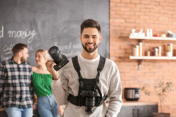 Portrait of male photographer in studio