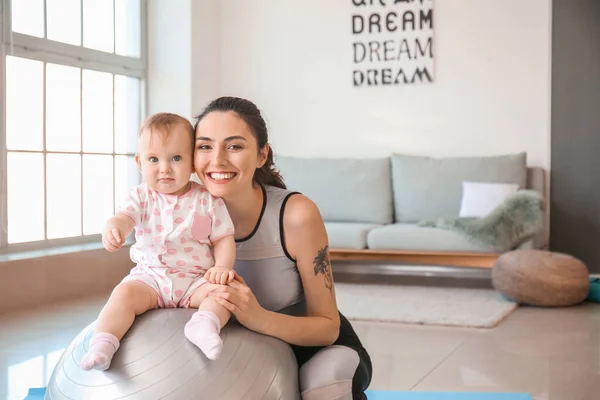 Young Sporty Mother Her Baby Doing Exercises Fitball Home — Stock Photo, Image