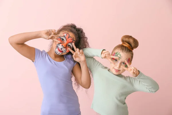 Niños Divertidos Con Pintura Facial Sobre Fondo Color —  Fotos de Stock