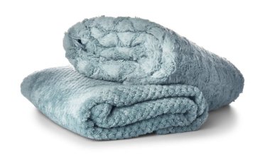 Beyaz arkaplanda yumuşak battaniyeler